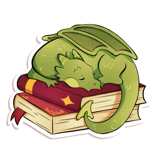 A product mockup of a fantasy themed vinyl sticker with a dragon sleeping on a stack of books. 
